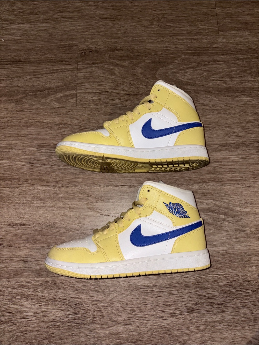 Jordan’s Yellow, White & Blue High-Top Sneakers